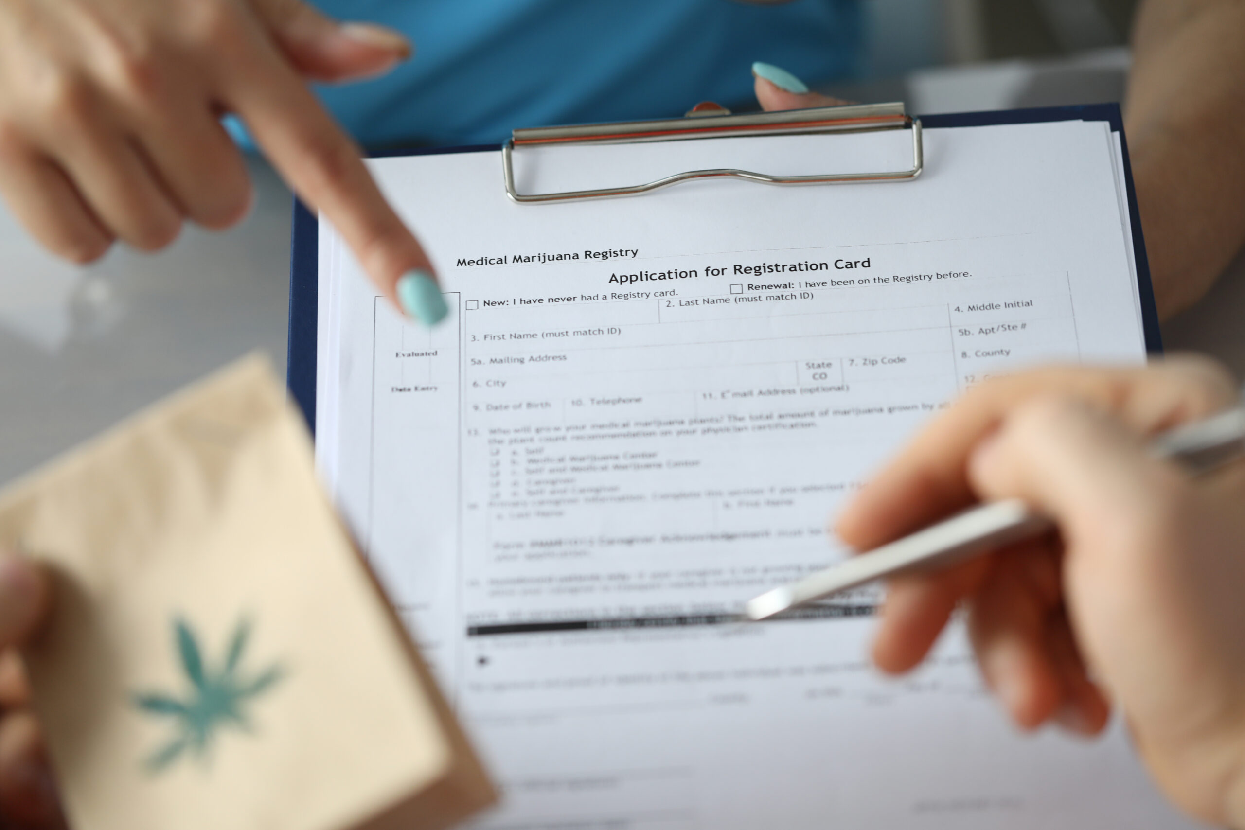 Medical Marijuana Prescription - Patient filling application for registration card